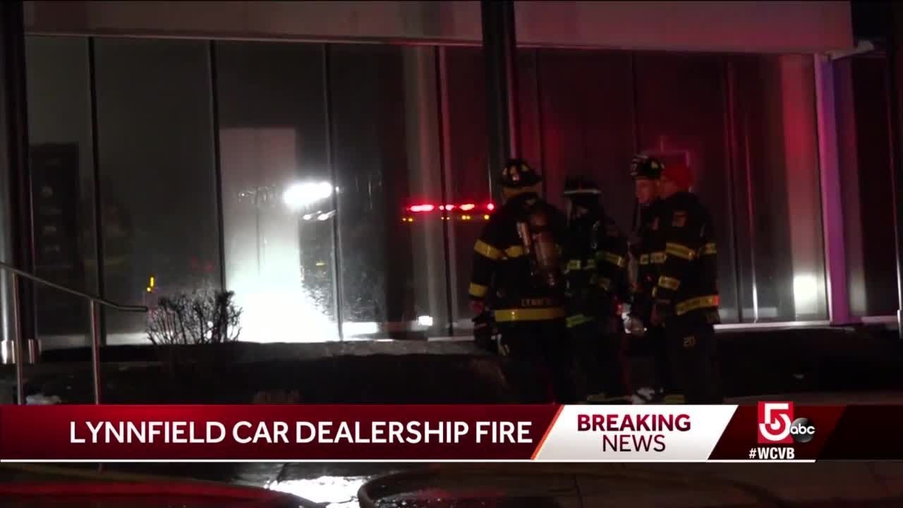 Crews battle fire in Mercedes dealership showroom - YouTube