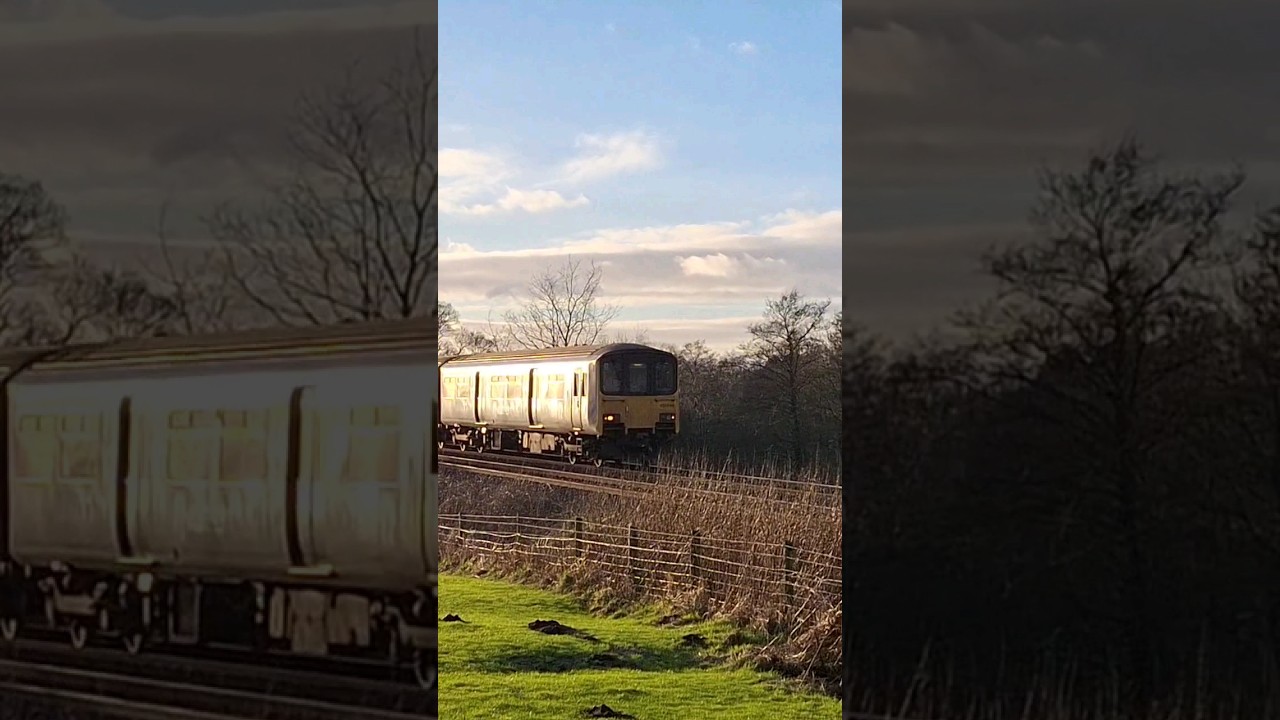 Class 150 passes a sunny Langho! 