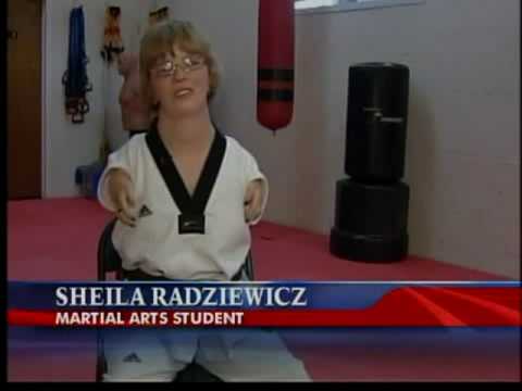 Disabled Woman defies odds by getting black belt (...