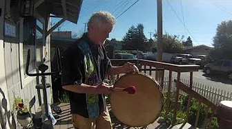 Bill playing a Native American medicine drum.