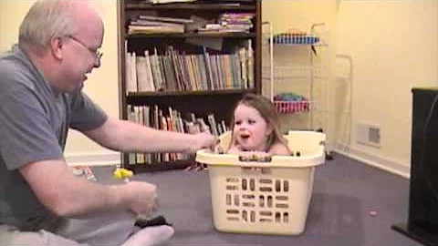 Jenna in clothes basket