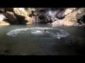 Jake swings into pool under waterfall