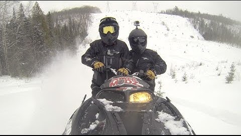 Two guys one snowmobile.  Louie and Kealey try RKTek 827 Big bore at the same time!