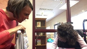 Having a back and forth conversation with PODD using partner assisted scanning.