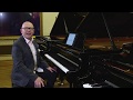 Piano lesson by Graham Fitch on relaxing the left hand, pedalling through staccato, and more