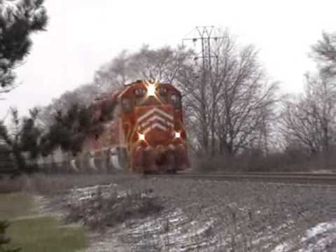 EJ&E 674 leads the loaded State Line coal train east - New Lenox, IL. 12/15/08