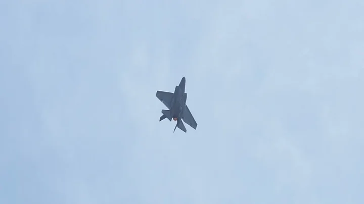 F-35 Fighter Jet Forms Epic Vapor Cone Going Mach .92 Over Beach