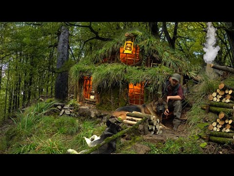 Building a natural survival shelter with a fireplace | Bushcraft scenic hut, grass roof, rain PART 2