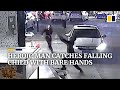 Heroic man catches falling child with bare hands