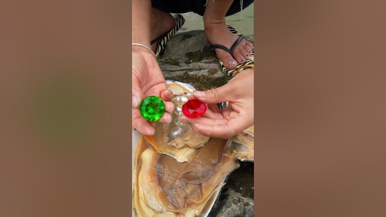  clams spit out red and green gemstones youtube