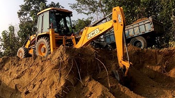 Loading Soil Video / Backhoe Loading Soil In Tractor Dump