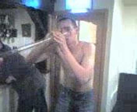 Ronnie downing a 'yard of ale' before he whisked o...