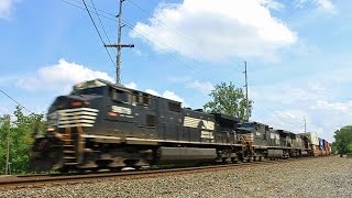 A pair of NS C44-9W's & SD70 round the curve in Millbury leading a WB Intermodal Train