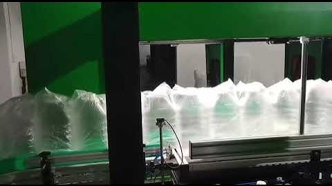 Fully automatic bottle bagging machine