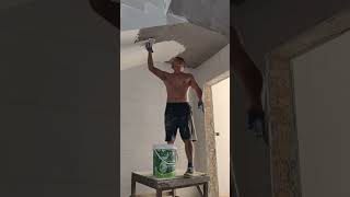 Real shots of construction site, putty scraping