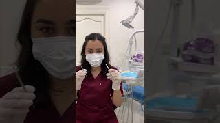 female dentist in gloves pov