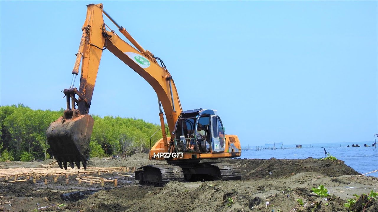 Excavator Working on The River Estuary Construction - YouTube