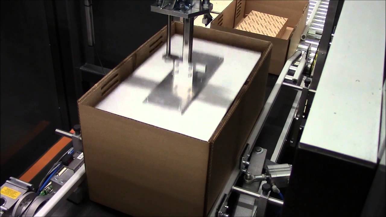 JOMET - Automatic wedge inserter into randomly filled boxes - YouTube
