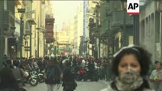 Police fire tear gas at protesters opposed to Fujimori's pardon
