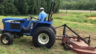 New Holland TC30 and Rhino Finish Mower