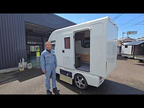 A fully custom-made mini camper van, made entirely in Japan, with a 3-month delivery time, and co...