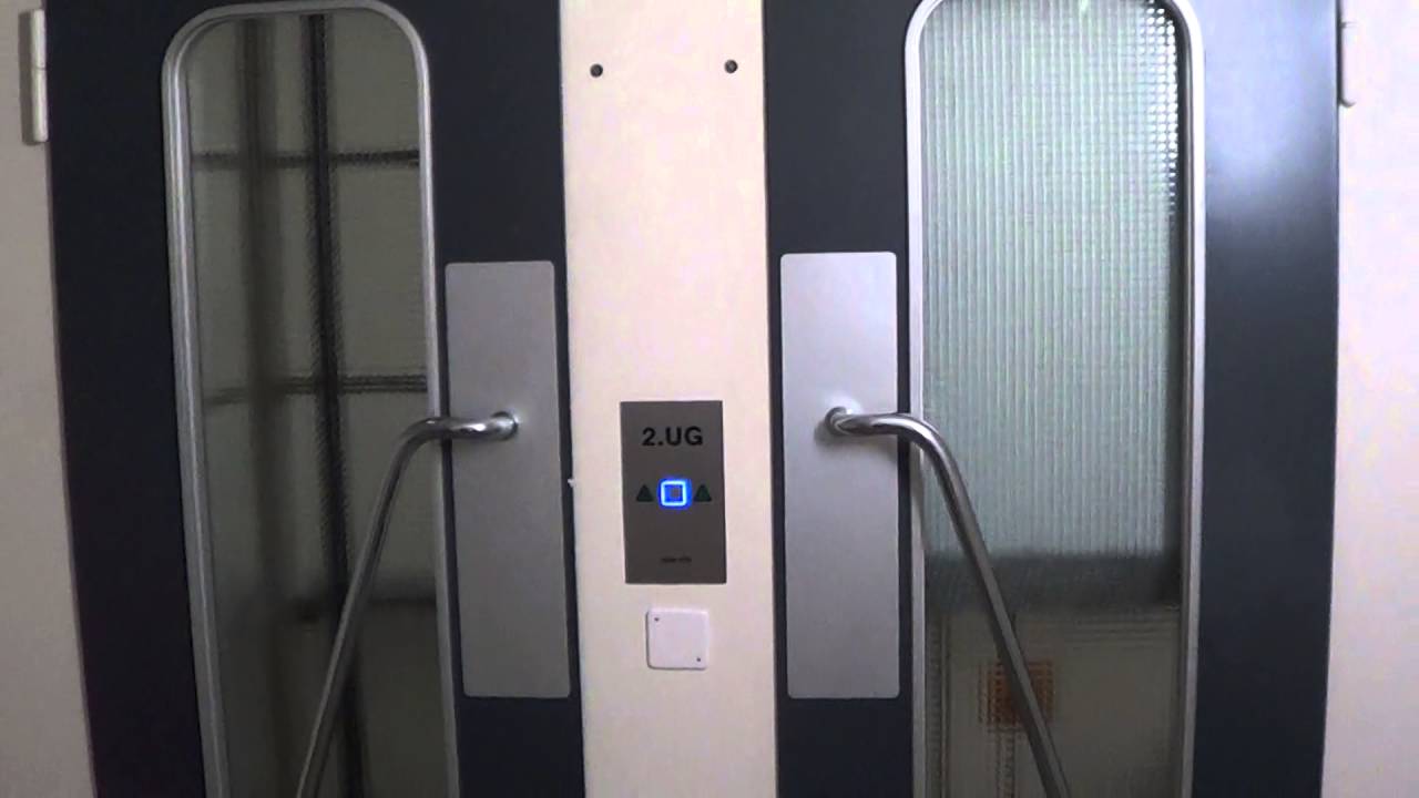 Two nice TRAPO KÜNG elevators in glass shaft @ Basel, Switzerland