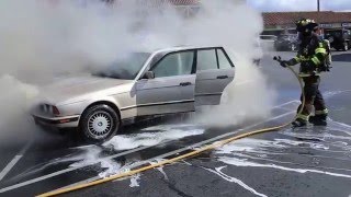 Fire erupts in parked car