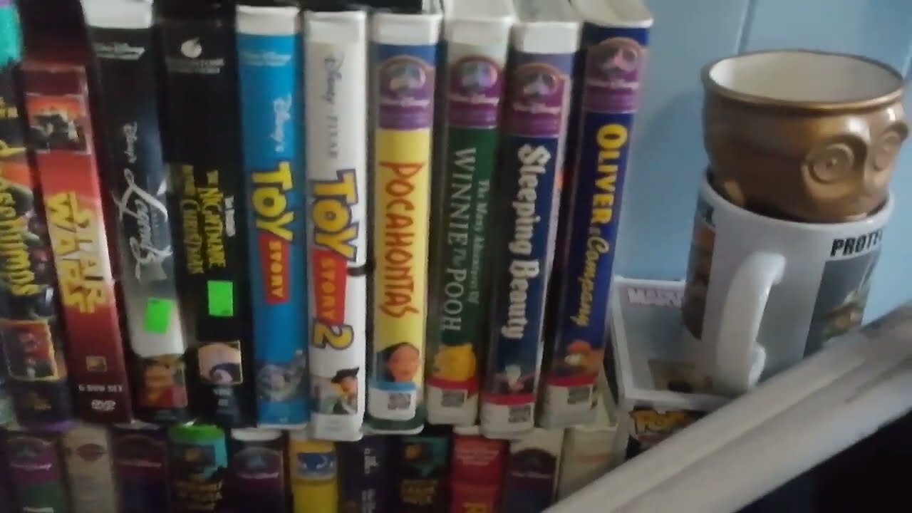 3 CLAM SHELLS AND COUPLE OTHER VHS