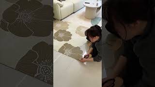This floor mat is absolutely irresistible! Its vibrant colors and design elevate the style our home.