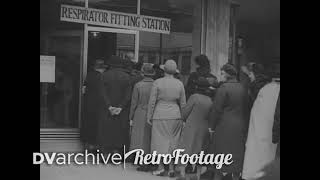 1938 - British women and children are fitted for respirators