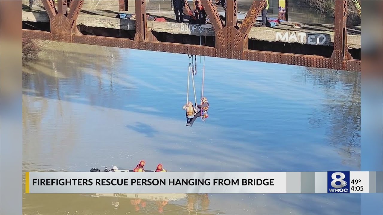 Rochester firefighters rescue photographer swinging from bridge