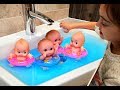 Baby Dolls Swimming in the Sink