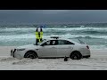 Storm chaser brandon copic absolutely buried his car in sand while waterspout watching lol