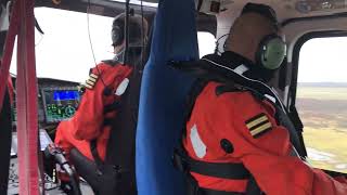 AW-169 Helicopter serving off shore wind generators taking off from Borkum island in the North Sea