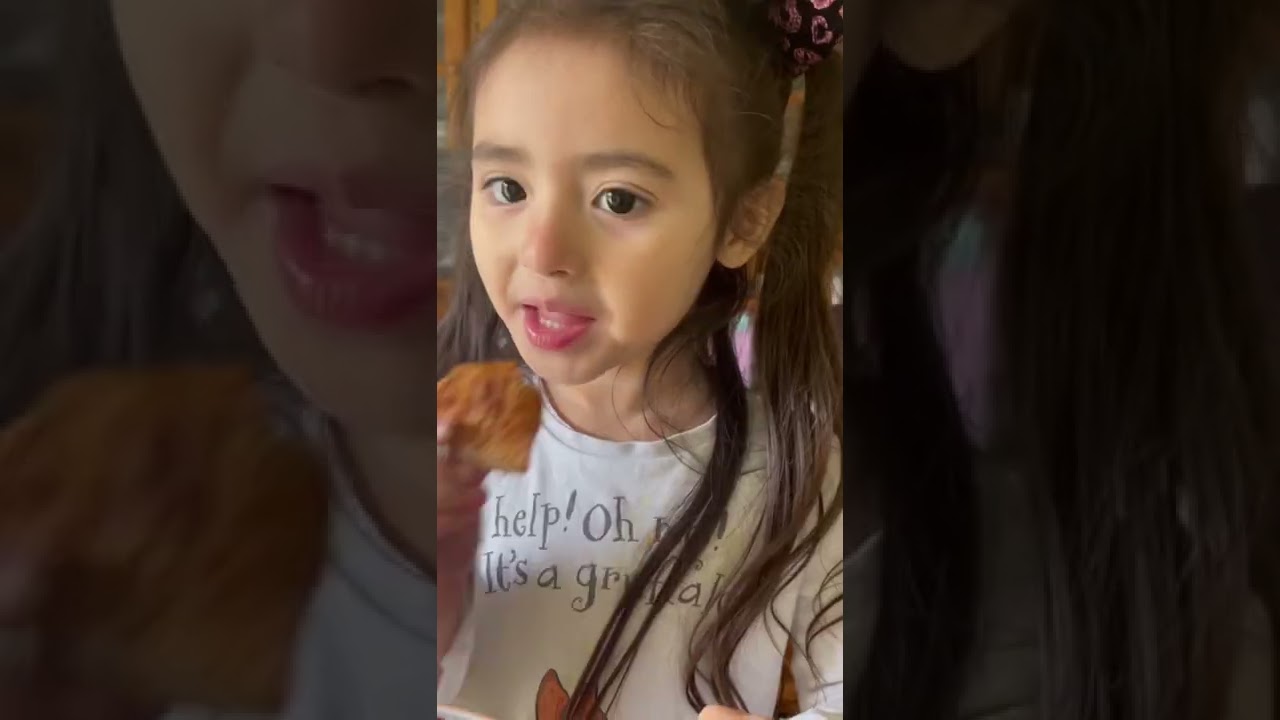 My British Filipina daughter tried filipino hotdog and dried squid for the first time😅