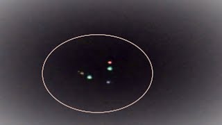 Triangular UFO with Pulsing Colored Lights Filmed over Caguas, Puerto Rico