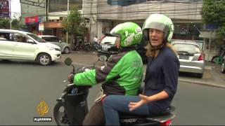 Motorbike app shakes up traditions in Indonesia screenshot 2