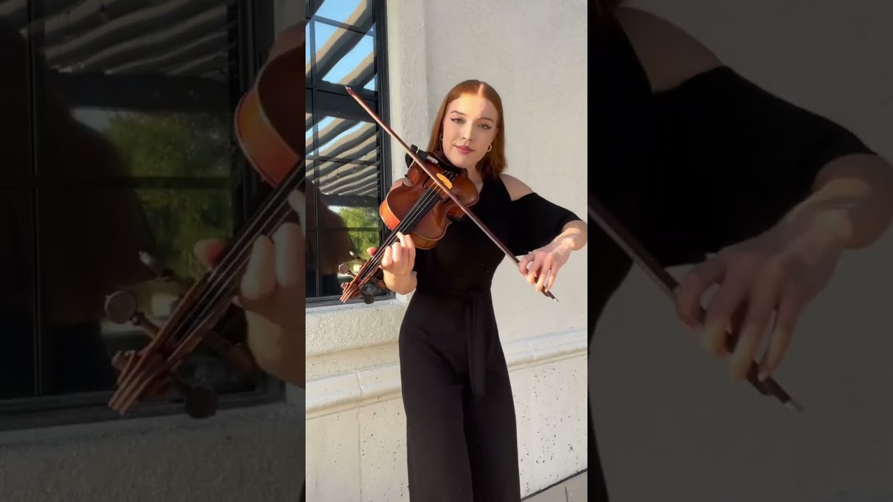 Katie performing live as a strolling violinist