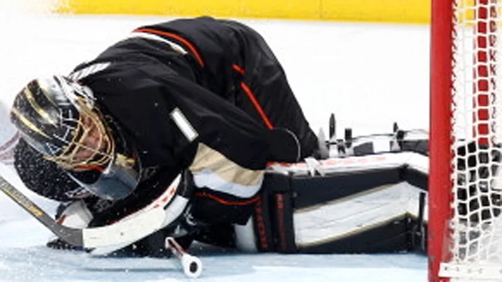 Jonas Hiller dives to make a phenomenal save