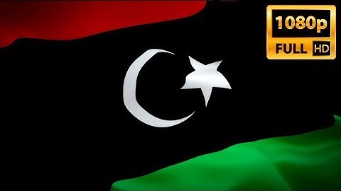 Libya flag closeup 1080p Full HD 1920X1080 footage video waving in wind. ‎Libyan‎ flag Full HD