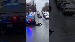 Officer Slips on Black Ice as Cars Slide Down Hill 🚓