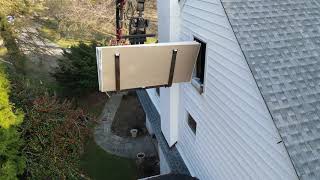 Impossible Drywall Delivery around the corner and to the 3rd floor by boom truck