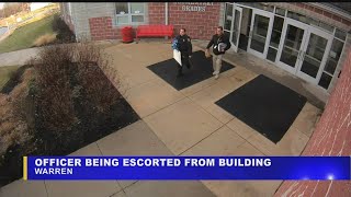 Warren School District issues statement on officer's escort from property