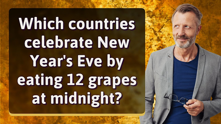 Which countries celebrate New Year's Eve by eating 12 grapes at midnight?