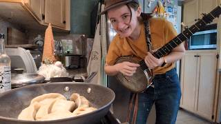 frying dumplings while practicing banjo