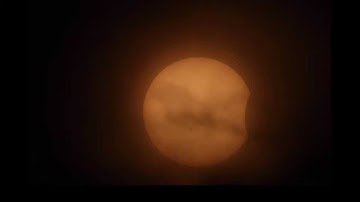 Partial Solar Eclipse through Thick Clouds