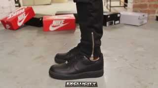 all black air force ones on feet