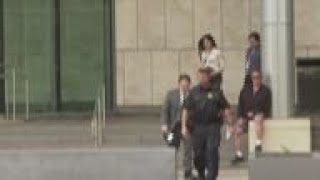 AP writer describes parade suspect's court hearing