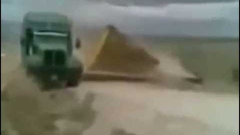 Brand new Dozer get trashed as low loader rolls away