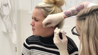 Tragus Piercing - check out her reaction